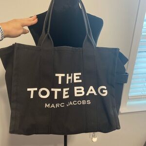 Marc Jacobs Black Tote Bag with Sturdy Fabric and Prominent Text